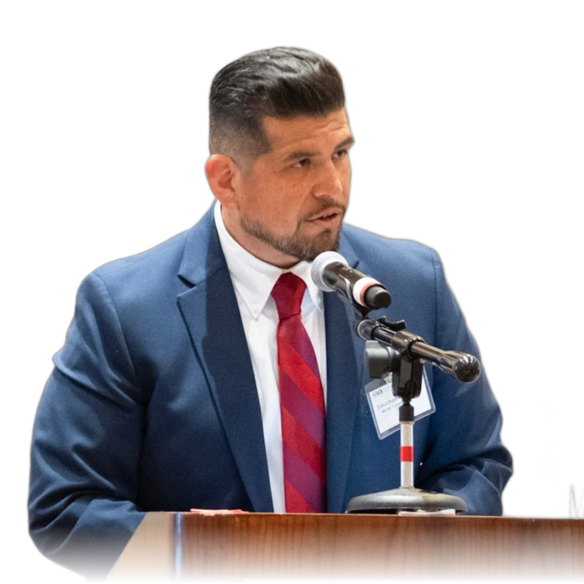 Jonathan Ontiveros speaking at a podium